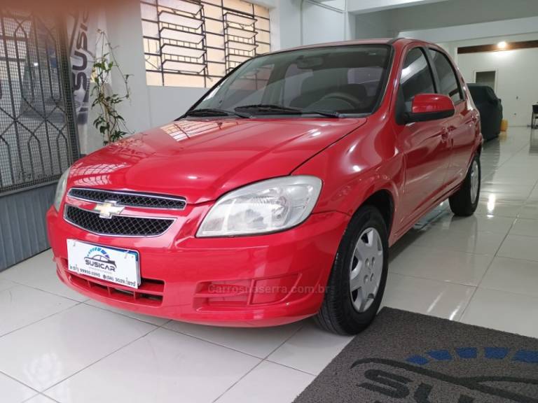 CHEVROLET - CELTA - 2013/2014 - Vermelha - R$ 34.500,00