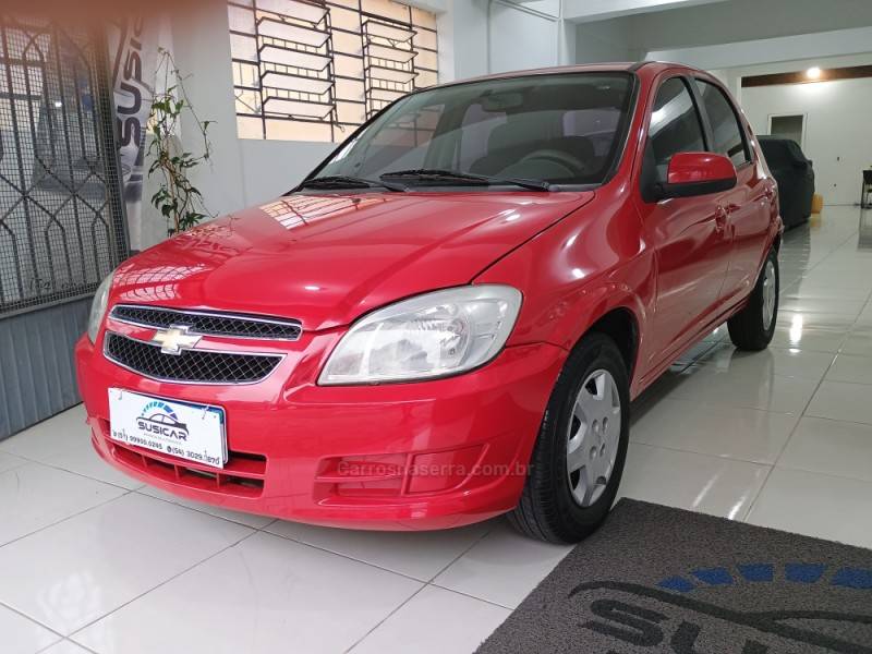 CHEVROLET - CELTA - 2013/2014 - Vermelha - R$ 34.500,00