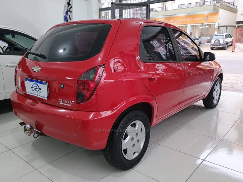 CHEVROLET - CELTA - 2013/2014 - Vermelha - R$ 34.500,00